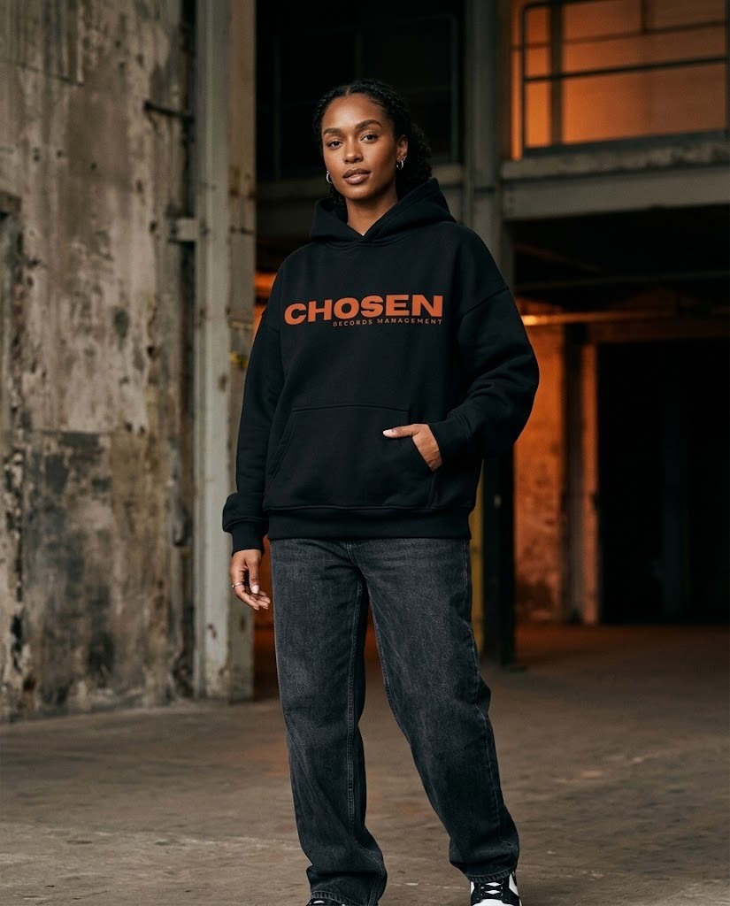 Female model wearing CHOSEN hoodie